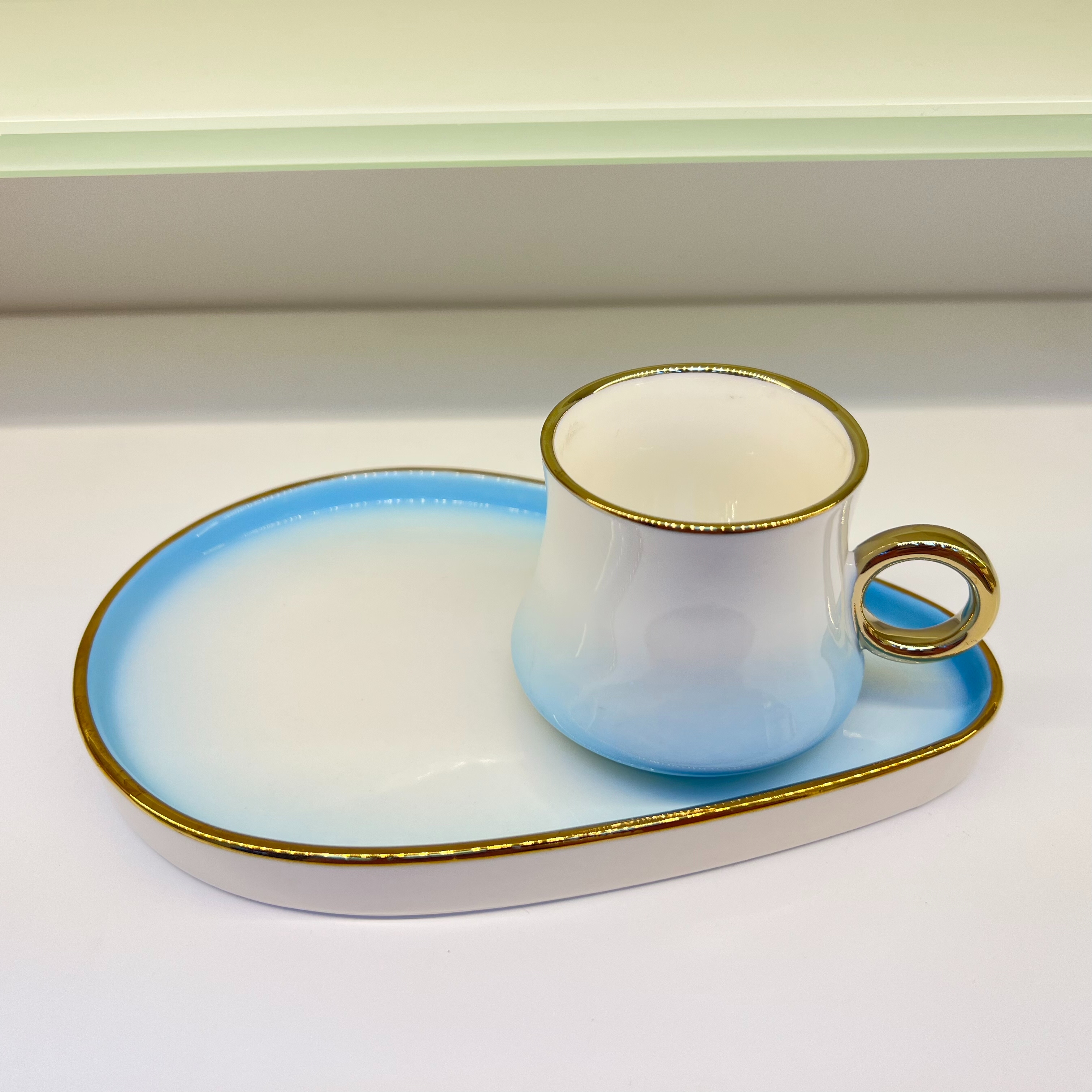 New style of simple ceramic coffee cups and saucers for export to the Middle East and Arabia, with a gradient of 90cc and 160cc. Creative gift sets for afternoon tea, with various patterns available for customization details Picture