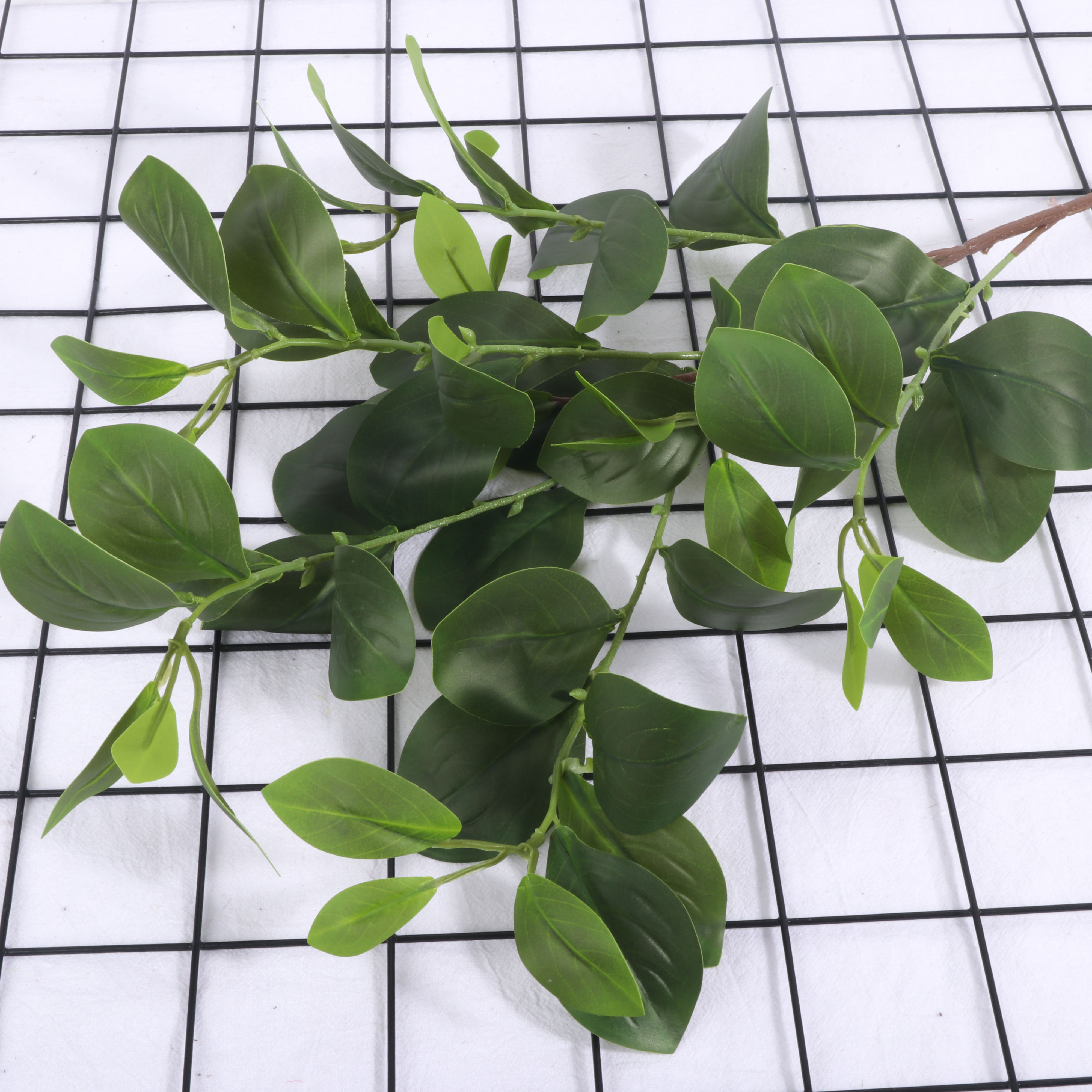 Artificial green plants with artificial broad leaves, green leaf plants, garden landscaping, soft decoration, flower arrangement accessories, home and wedding decoration, artificial green plants, green leaves, artificial plant leaves, soft decoration engineering decoration Application Scenario
