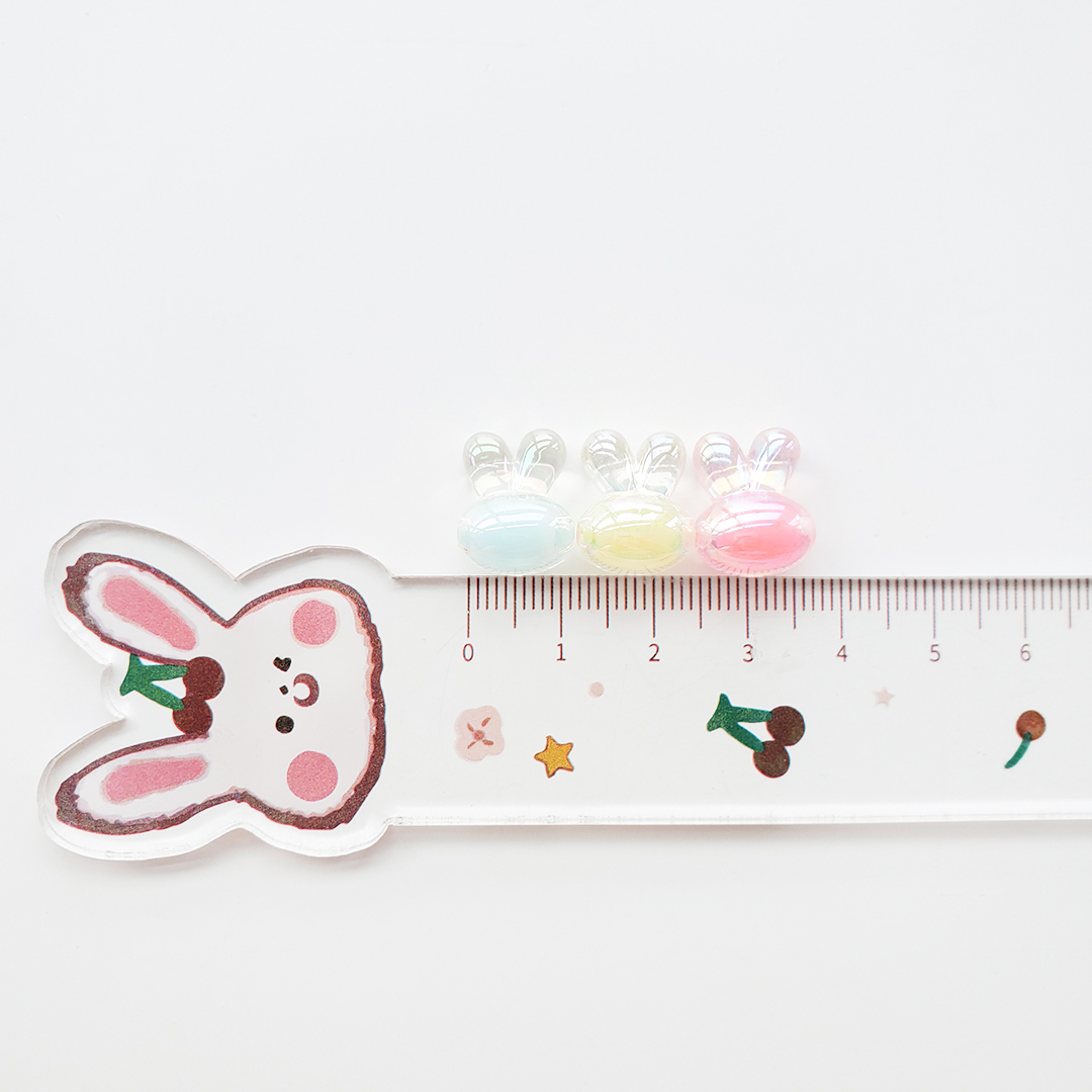Little rabbit head bead acrylic two-color seven-color magic cartoon candy color bead middle bead hair string material Item Picture