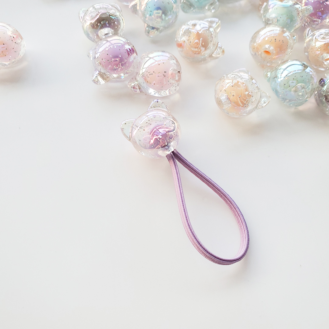 Chen Ming Acrylic dynamic seven-color cartoon dog head accessories, diy children's hair tie accessories, half-hole scattered bead material Item Picture