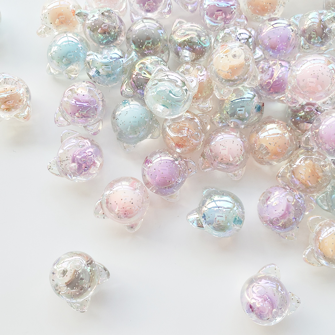 Chen Ming Acrylic dynamic seven-color cartoon dog head accessories, diy children's hair tie accessories, half-hole scattered bead material Application Scenario