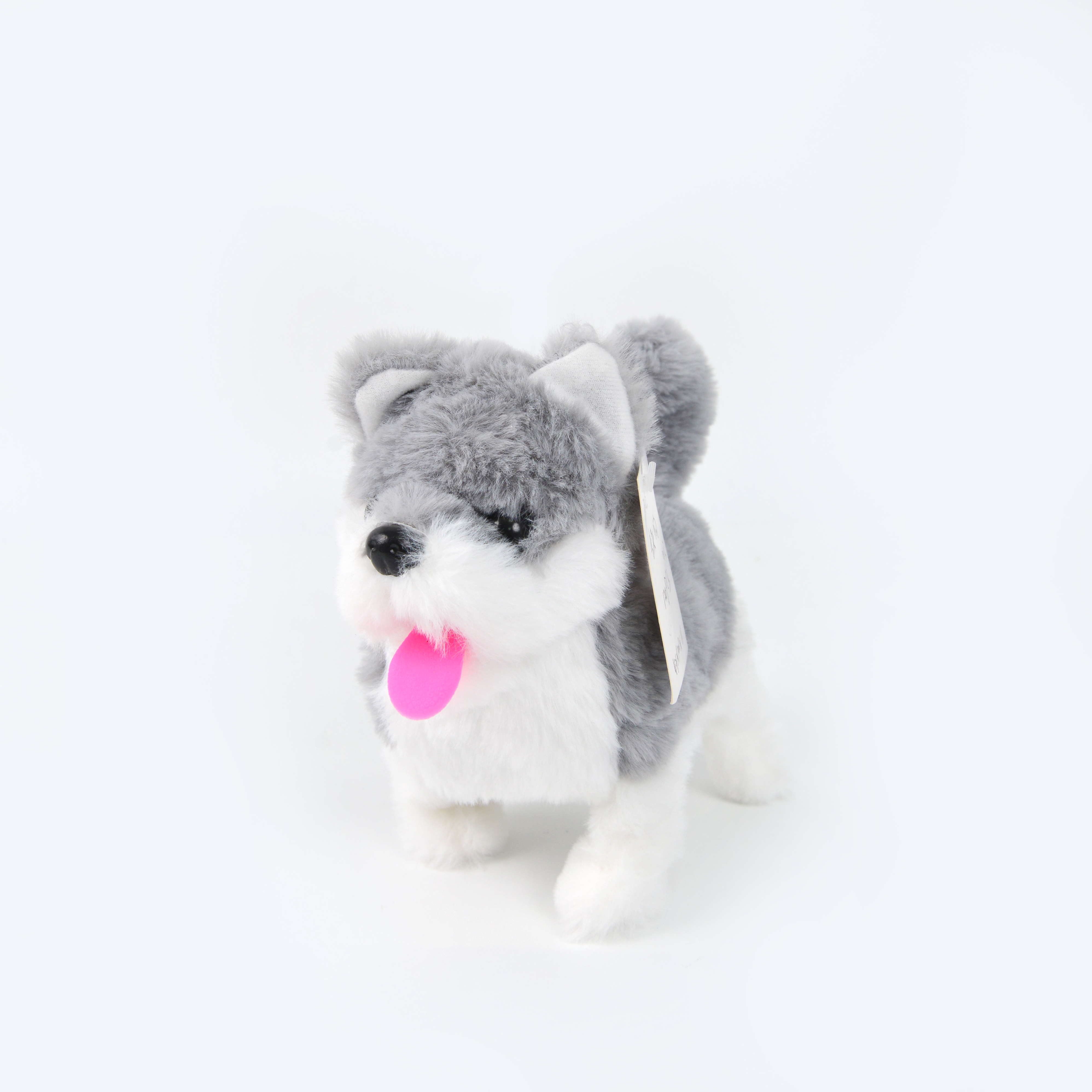 The simulated plush electric dog can walk, bark, nod, shake its head and wag its tail. It's a children's toy. Wholesale of electric huskies at street stalls