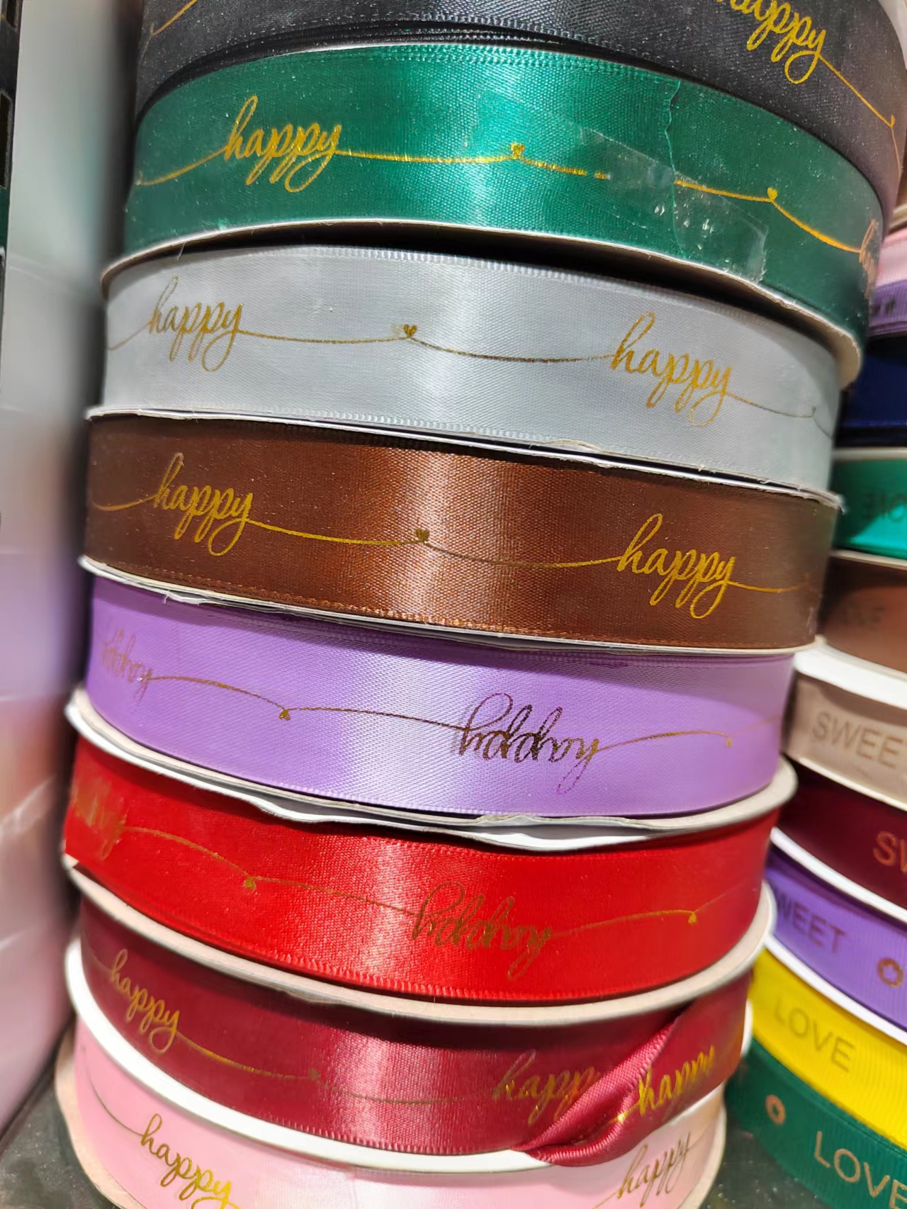 2.5 cm gold-embossed ribbon