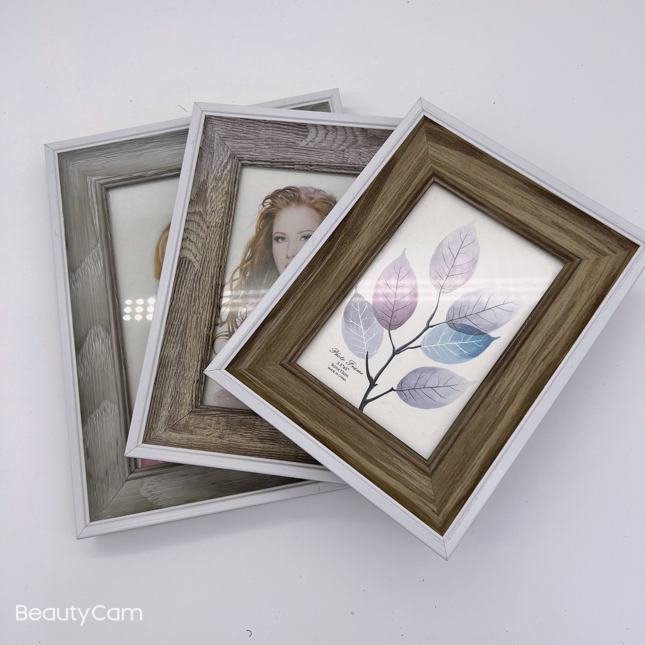 Indoor decoration resin photo frame manufacturer wholesale stock photo frame display stand Specification image