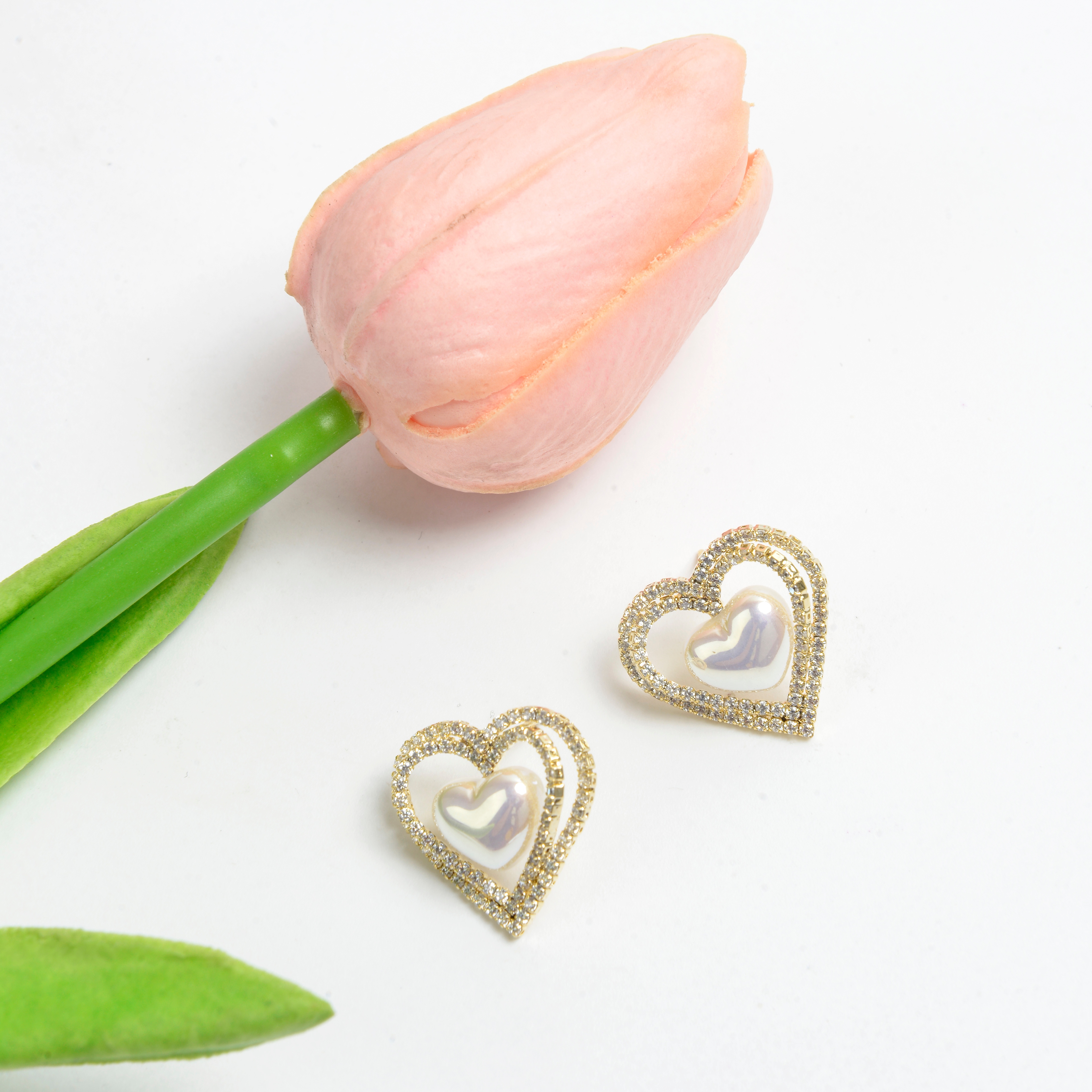 The new earrings feature a niche design with a high-end feel. They are French earrings for women, anti-allergy 925 silver needle, Mermaid Princess, heart with diamonds, and fashionable stud earrings Application Scenario