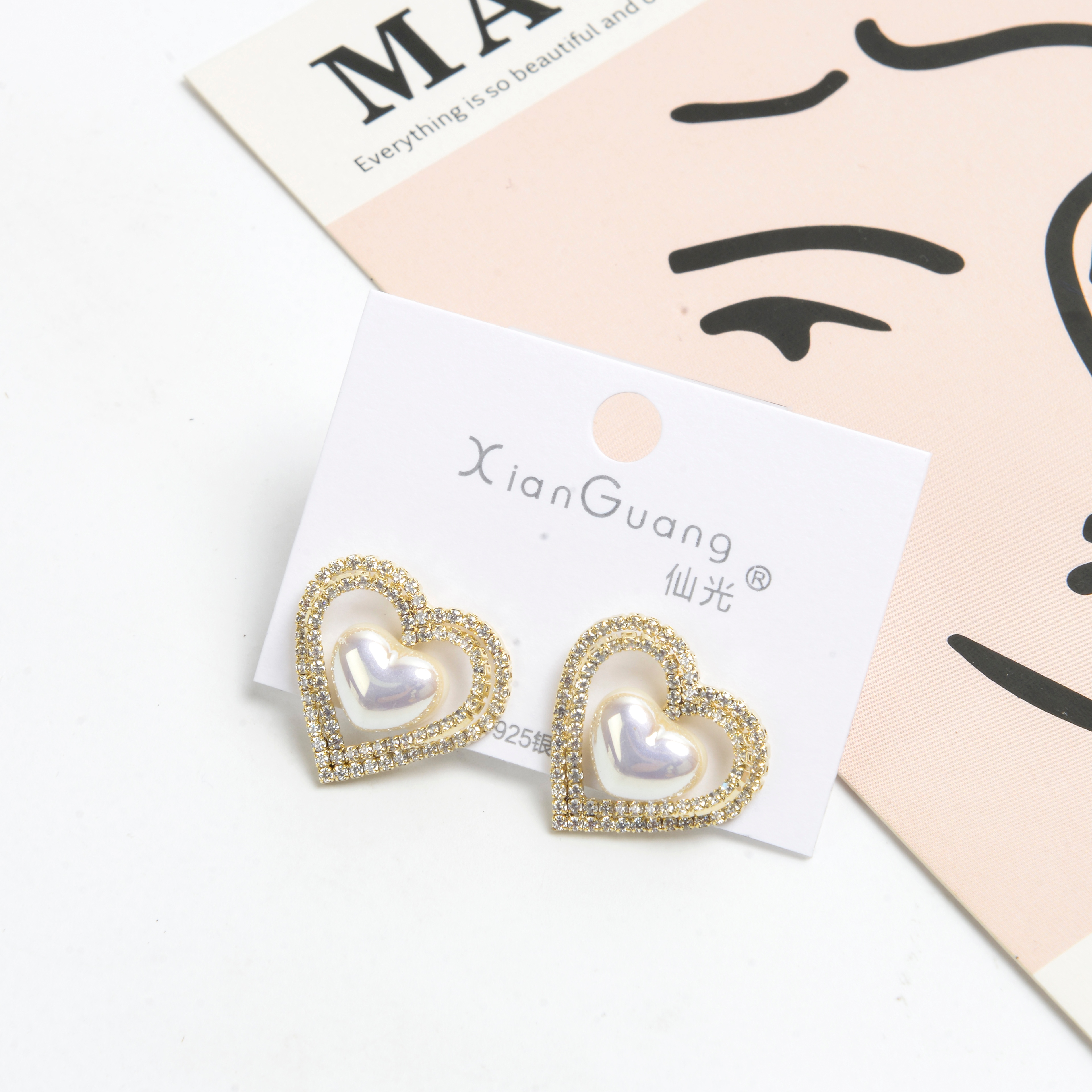 The new earrings feature a niche design with a high-end feel. They are French earrings for women, anti-allergy 925 silver needle, Mermaid Princess, heart with diamonds, and fashionable stud earrings details Picture
