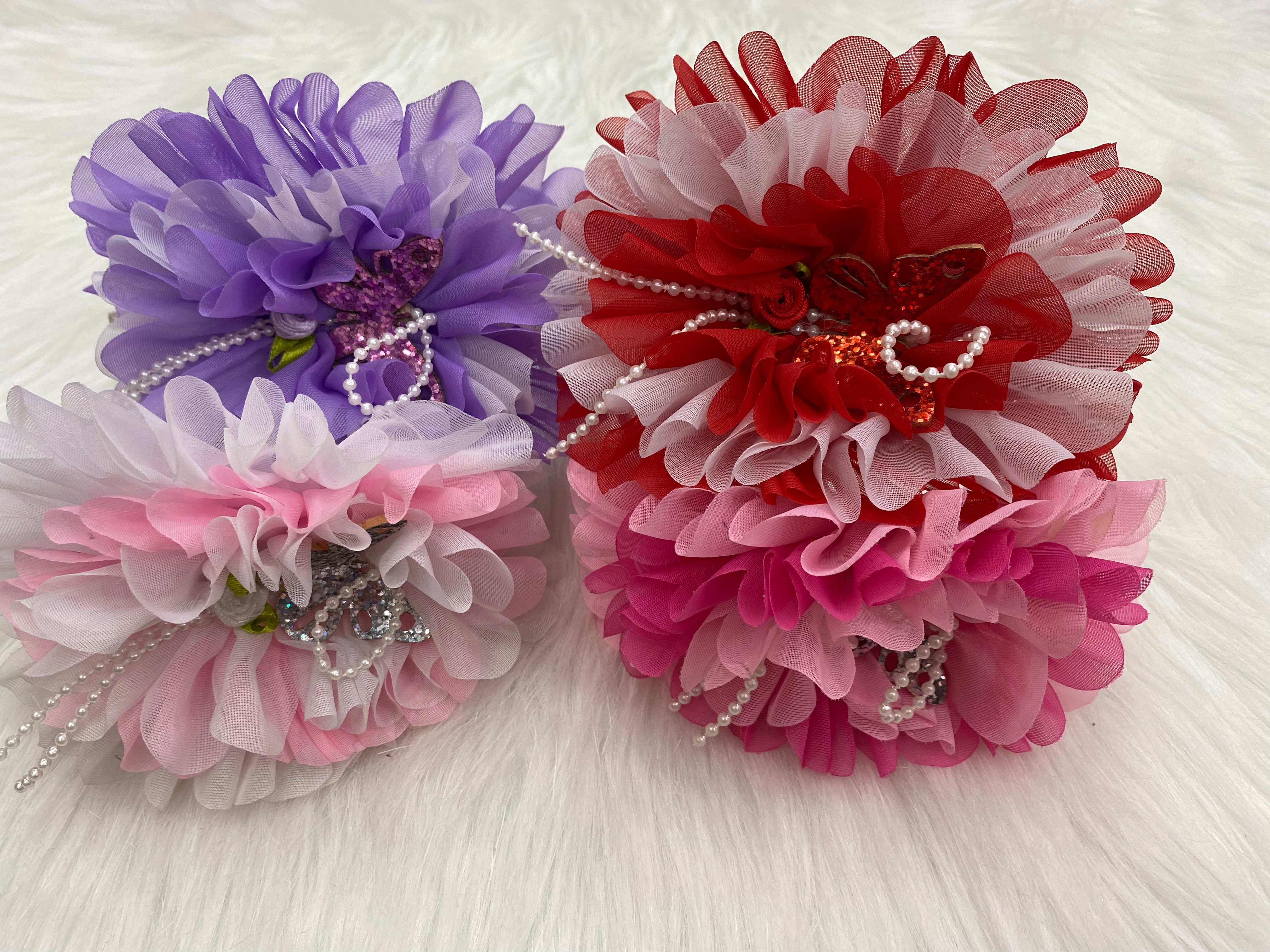 4 fashionable, versatile and trendy women's hair accessories with large floral patterns and pink butterflies, beaded headbands, and popular headwear from Melida accessories