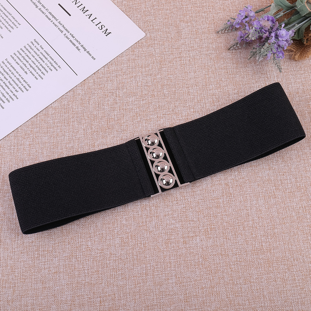 This is a fashionable lady's dress with a pearl button-down, elastic and tight waist belt that is versatile. It is decorated with an elastic waistband and a corset details Picture
