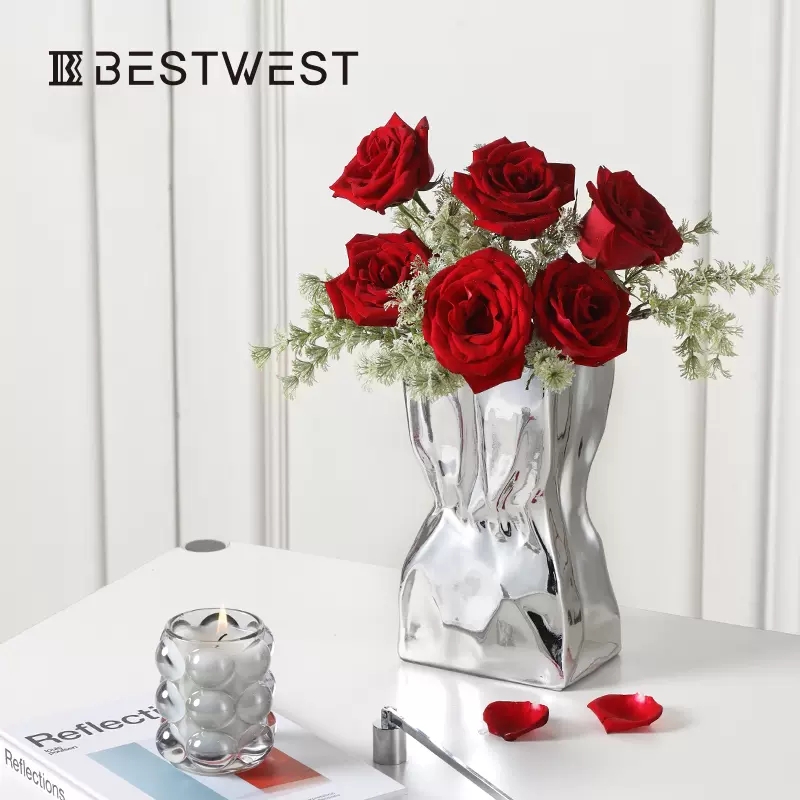 Creative electroplated vase, silver mirror finish, stainless steel texture, home decoration item, living room dining table, light luxury flower vase Application Scenario