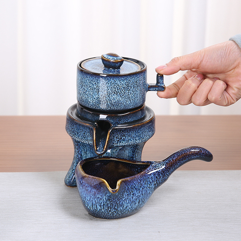 Kunkun Ceramics' new kilns change ceramic Gongfu tea set, creative brushed gradient color, semi-automatic home festival gift tea set for lazy people, automatic water discharge 117 Specification image