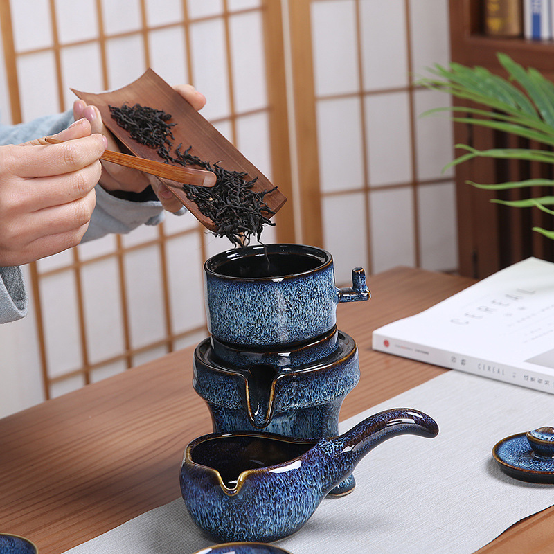 Kunkun Ceramics' new kilns change ceramic Gongfu tea set, creative brushed gradient color, semi-automatic home festival gift tea set for lazy people, automatic water discharge 117 details Picture