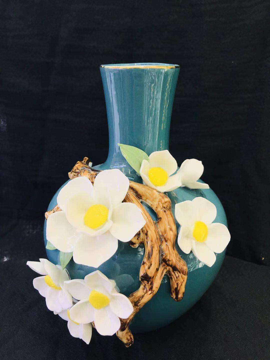 Green vase hand-molded flowers