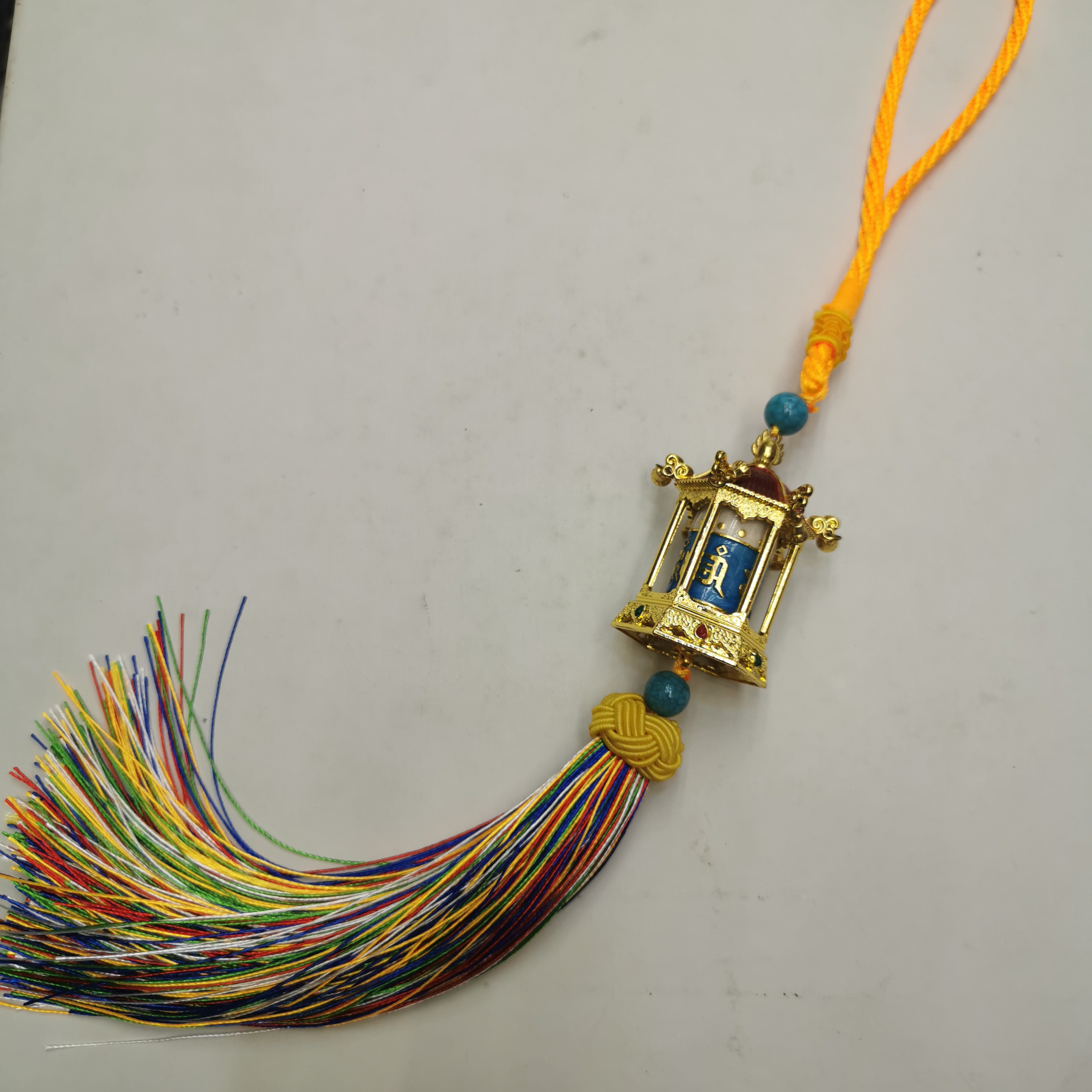 Alloy painted pavilion-shaped rotating wheel pendant YC0050 Application Scenario