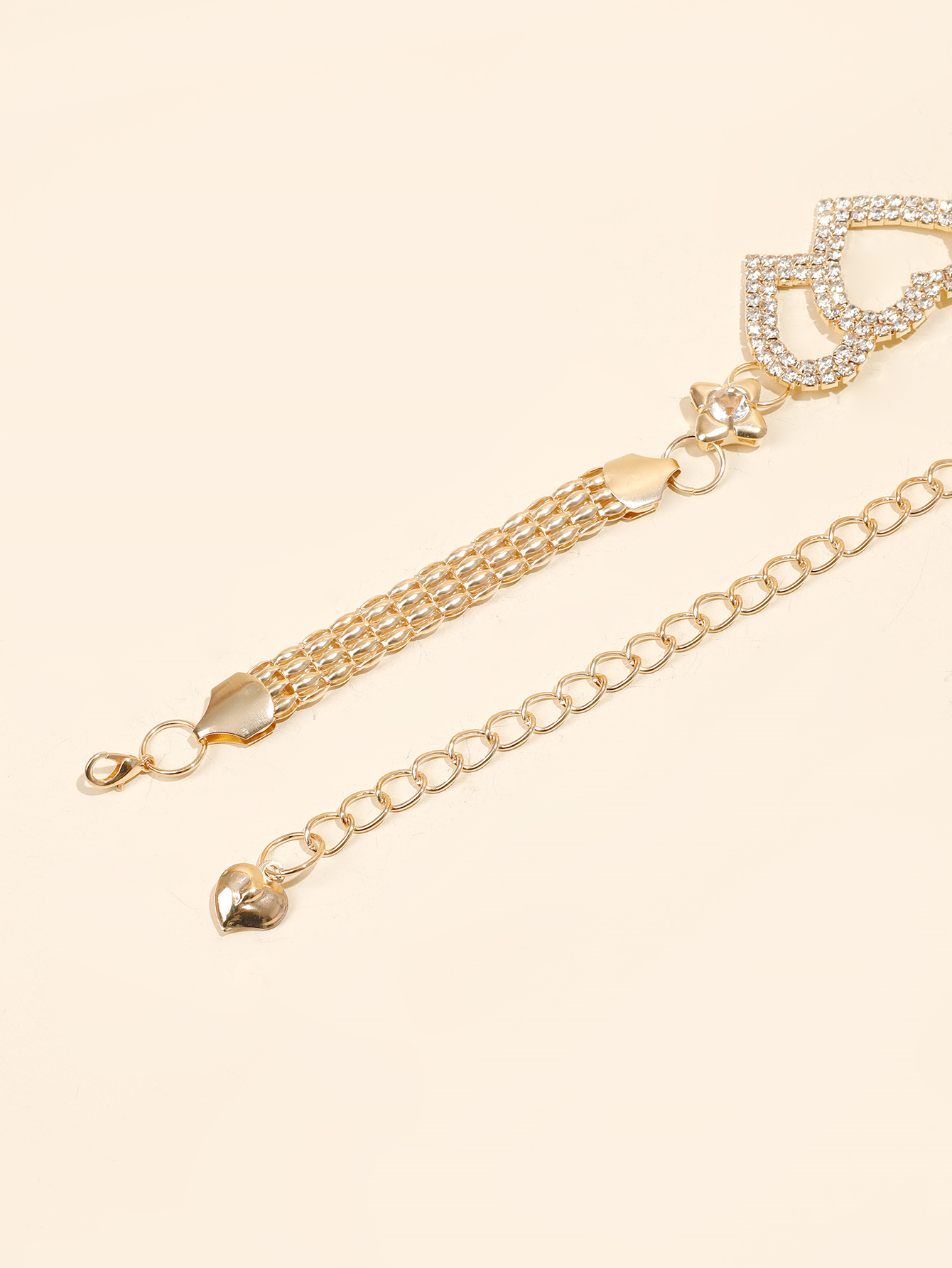 The y7 internet-famous golden metal rhinestone pearl leaf buckle spring elastic band pairs well with the thin waist chain belt of the pants for a trendy female look Application Scenario