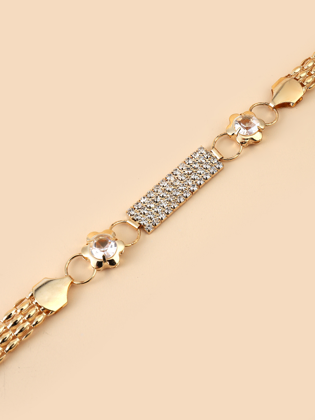 The y8 internet-famous golden metal rhinestone pearl leaf buckle spring elastic band pairs well with the thin waist chain belt of the pants for a trendy female look Item Picture
