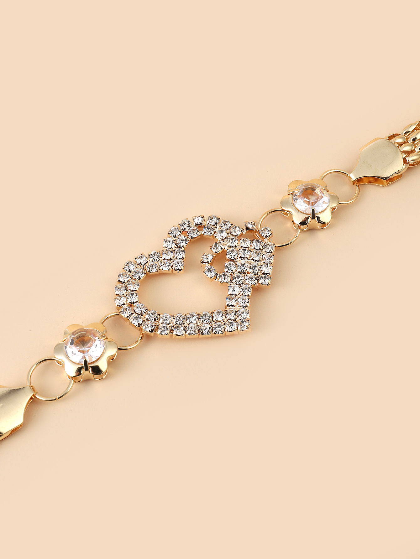 The y11 internet-famous golden metal rhinestone pearl leaf buckle spring elastic band pairs well with the thin waist chain belt of the pants for a trendy female look Item Picture