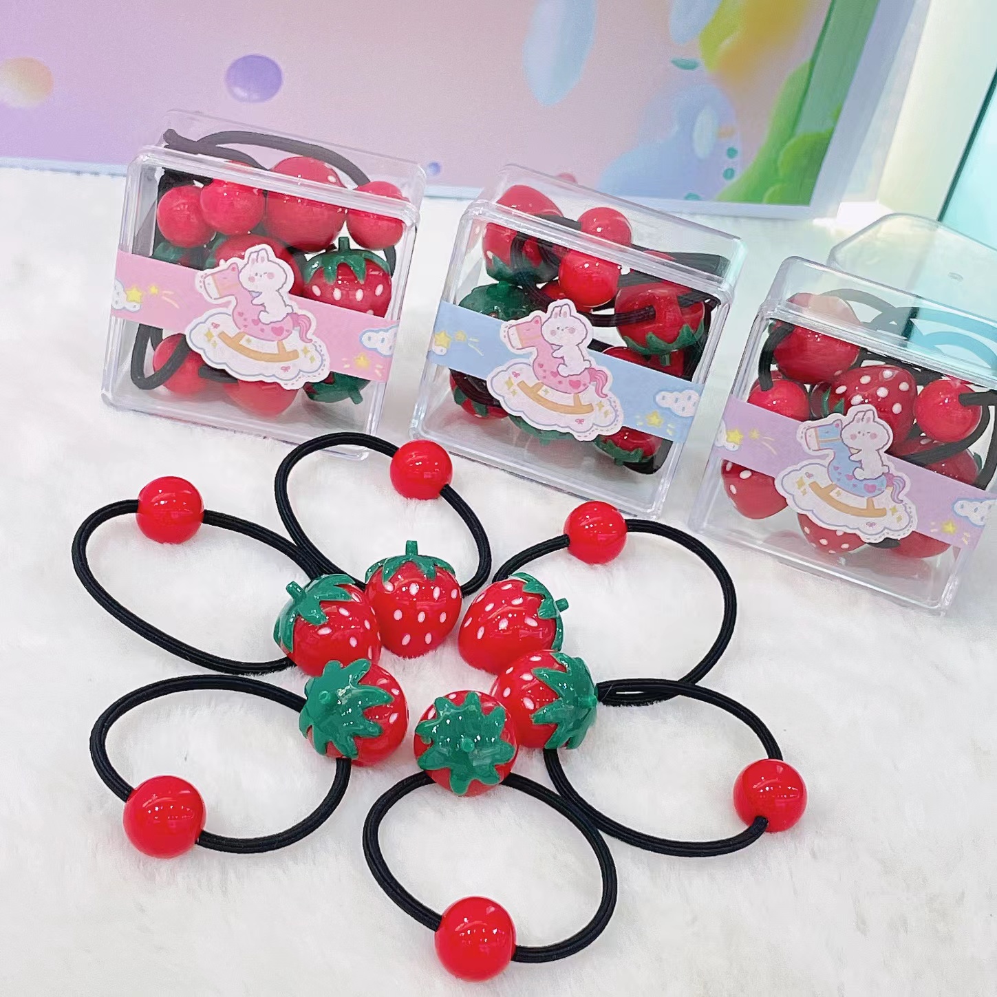 The classic red strawberry rubber band in the square box series is a cute and affordable 6-piece set with bright colors details Picture