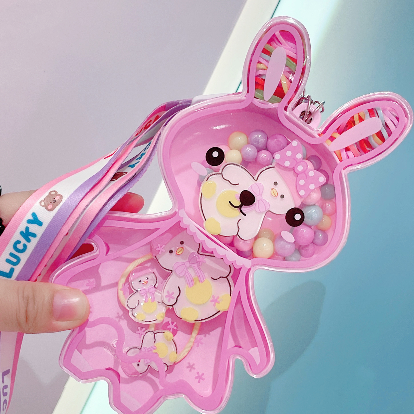 The webbing rabbit gift box can be worn diagonally or over the body. It comes in various combinations such as necklaces, hair clips, and rubber bands. With a variety of cartoon elements to choose from, it features a cute design and is a must-have for princesses details Picture
