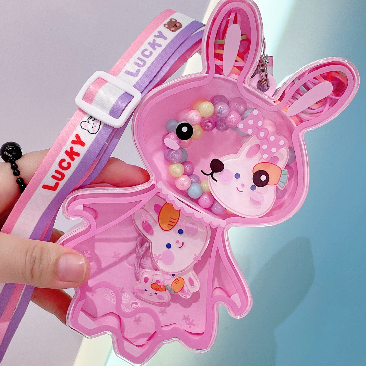 The webbing rabbit gift box can be worn diagonally or over the body. It comes in various combinations such as necklaces, hair clips, and rubber bands. With a variety of cartoon elements to choose from, it features a cute design and is a must-have for princesses Specification image
