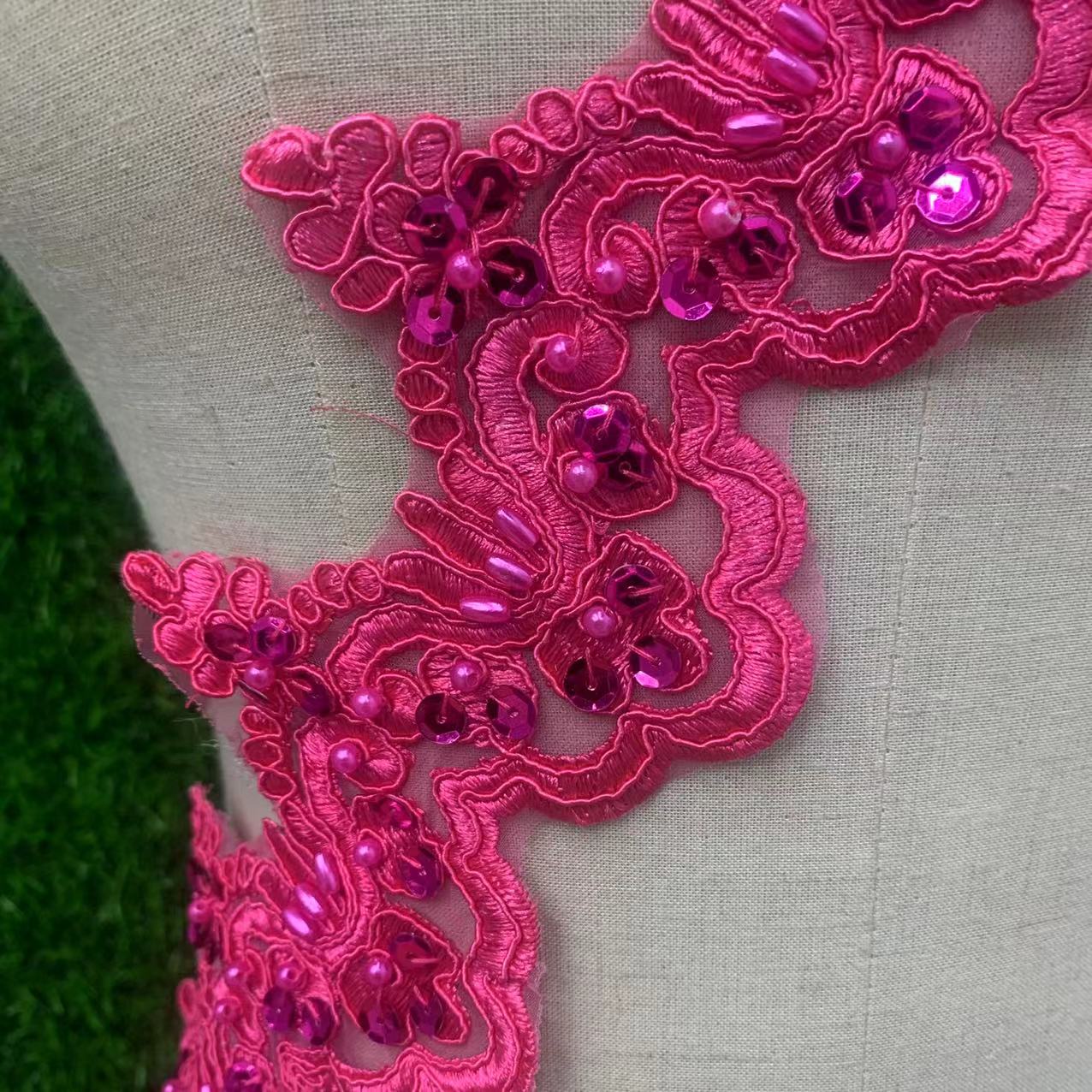 The clothing accessories feature golden sequins, bone spurs and embroidered edges details Picture