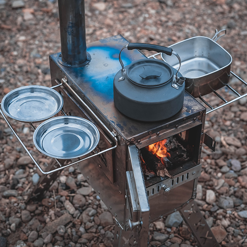 Xanoduji outdoor tent uses a portable camping stove with a chimney, a stove inside the tent, and a yurt tent heating stove Application Scenario