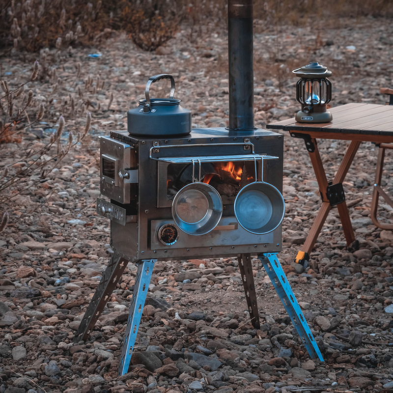 Xanoduji outdoor tent uses a portable camping stove with a chimney, a stove inside the tent, and a yurt tent heating stove