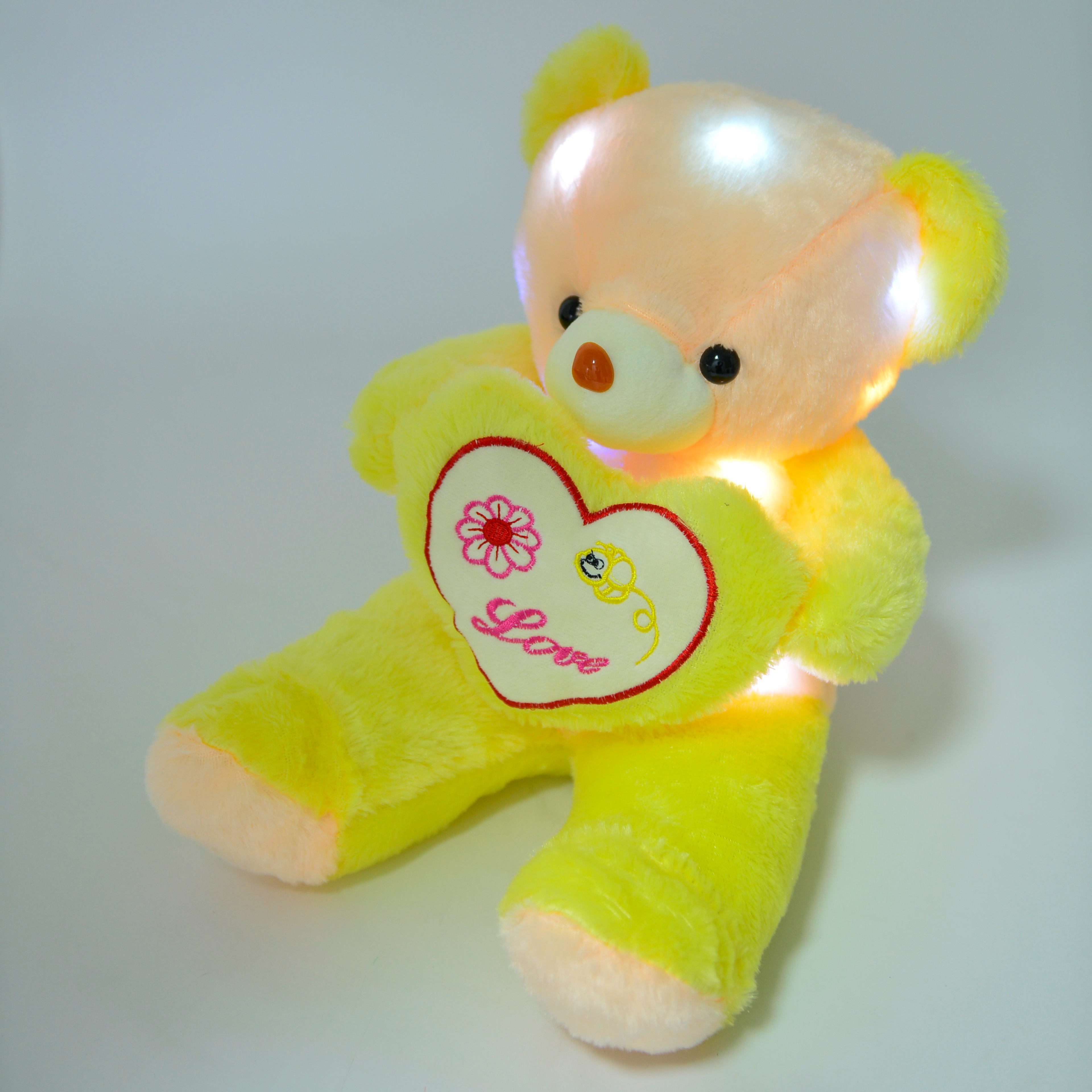 Creative luminous plush toy bear, seven-color luminous heart-shaped teddy bear doll manufacturer wholesale festival gifts Item Picture