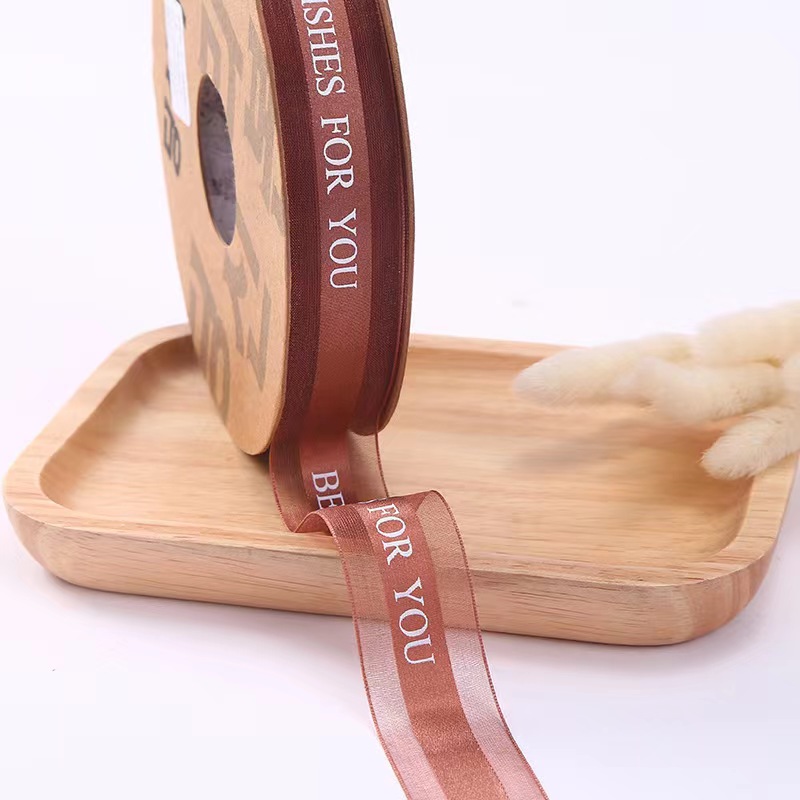 Dingxin Korean premium webbing, middle edge screen printed tape, middle printed tape, DIY ribbon, customizable LOGO edge transparent gauze tape, gift box packaging materials, hats, straw hats, clothing and accessories Application Scenario