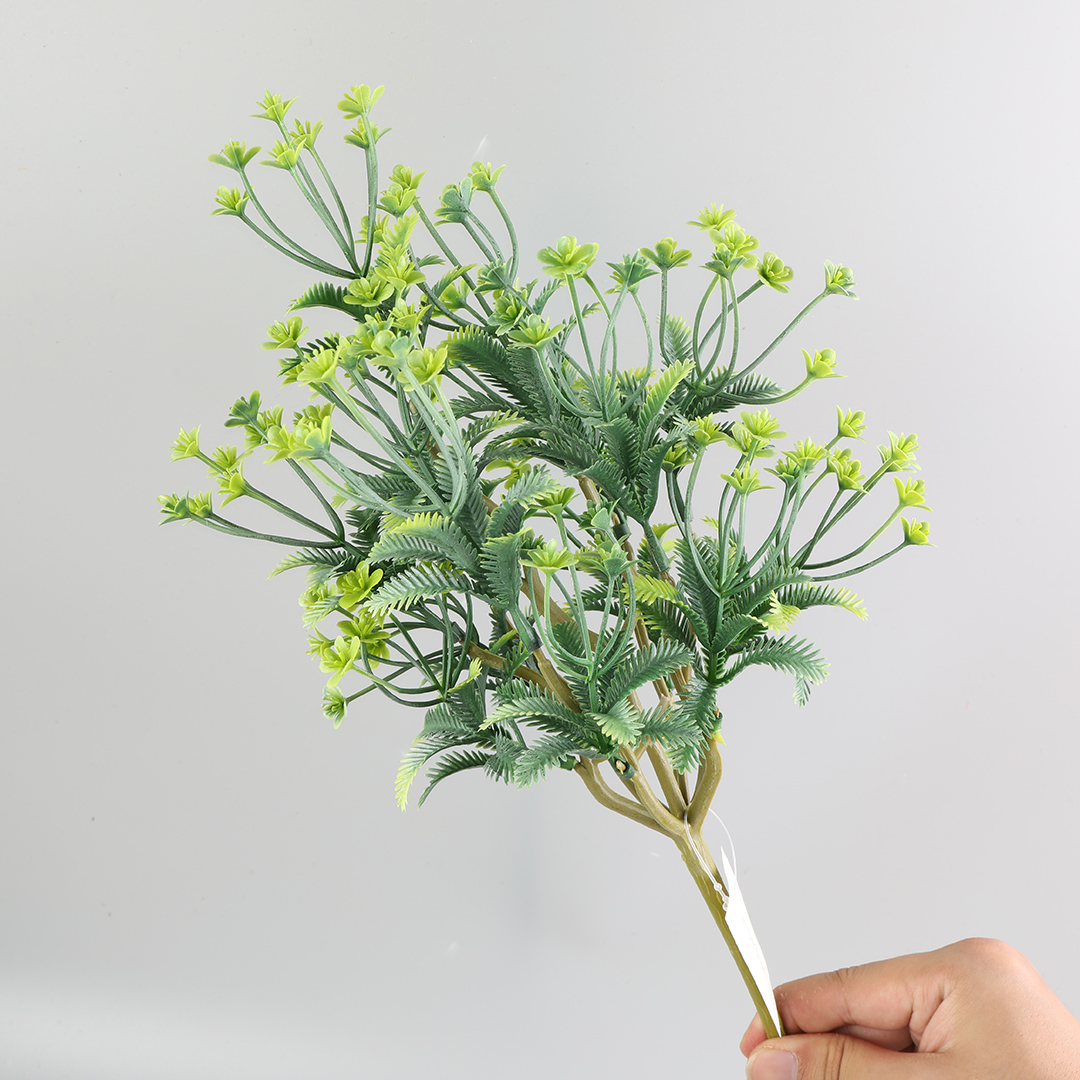 Artificial plants in flowerpots used for indoor home decoration
