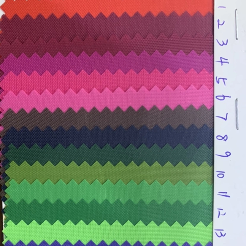 Factory direct sales of the best-selling new Oxford Cloth No. 1 with a bright red mesh pattern. Large quantities of high, medium and low-end bags, sofas, shoes and fabrics in stock Specification image