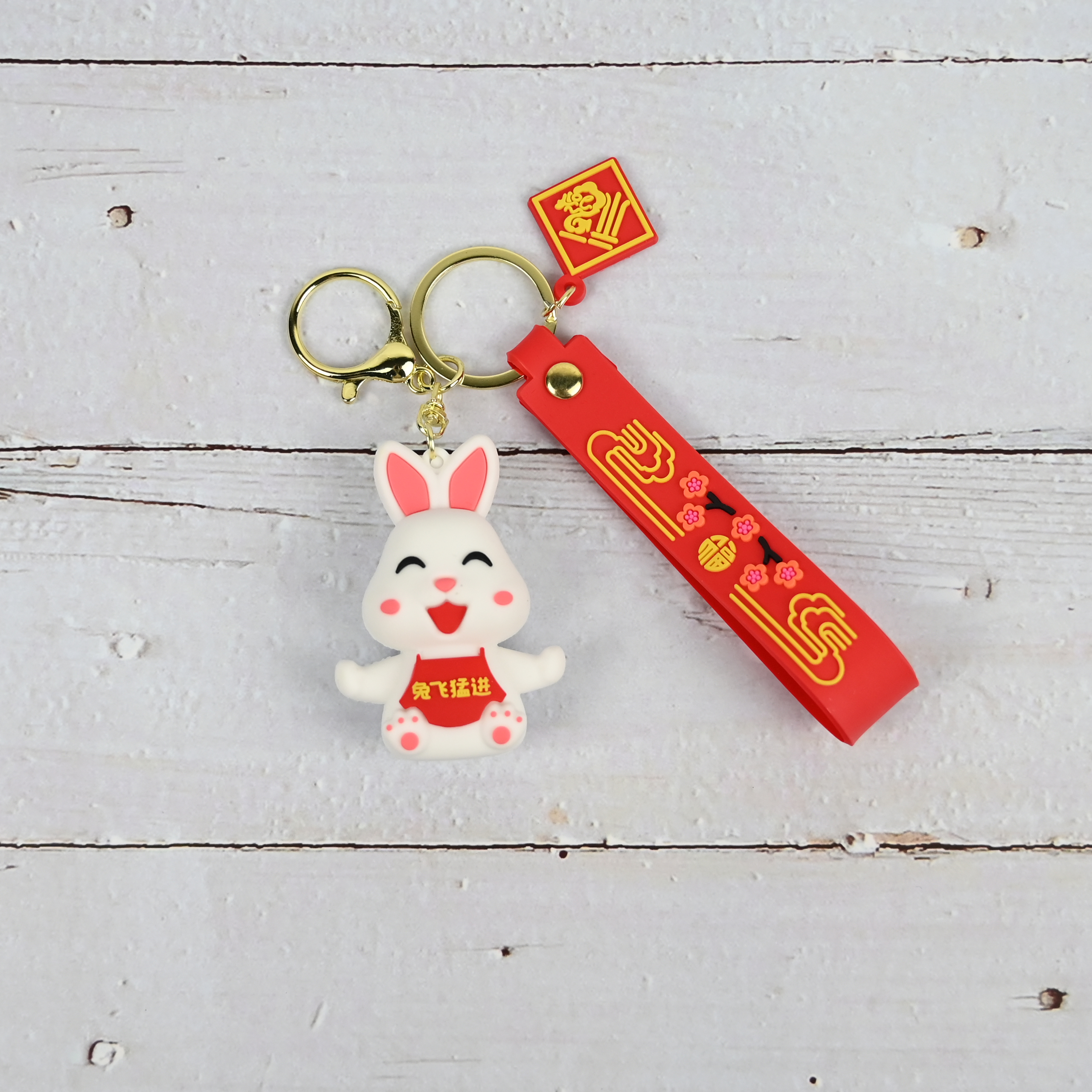 Wholesale of new festive and lucky rabbit keychains, cute female bags, pendants and New Year key chains for the Year of the Rabbit 2023 Application Scenario