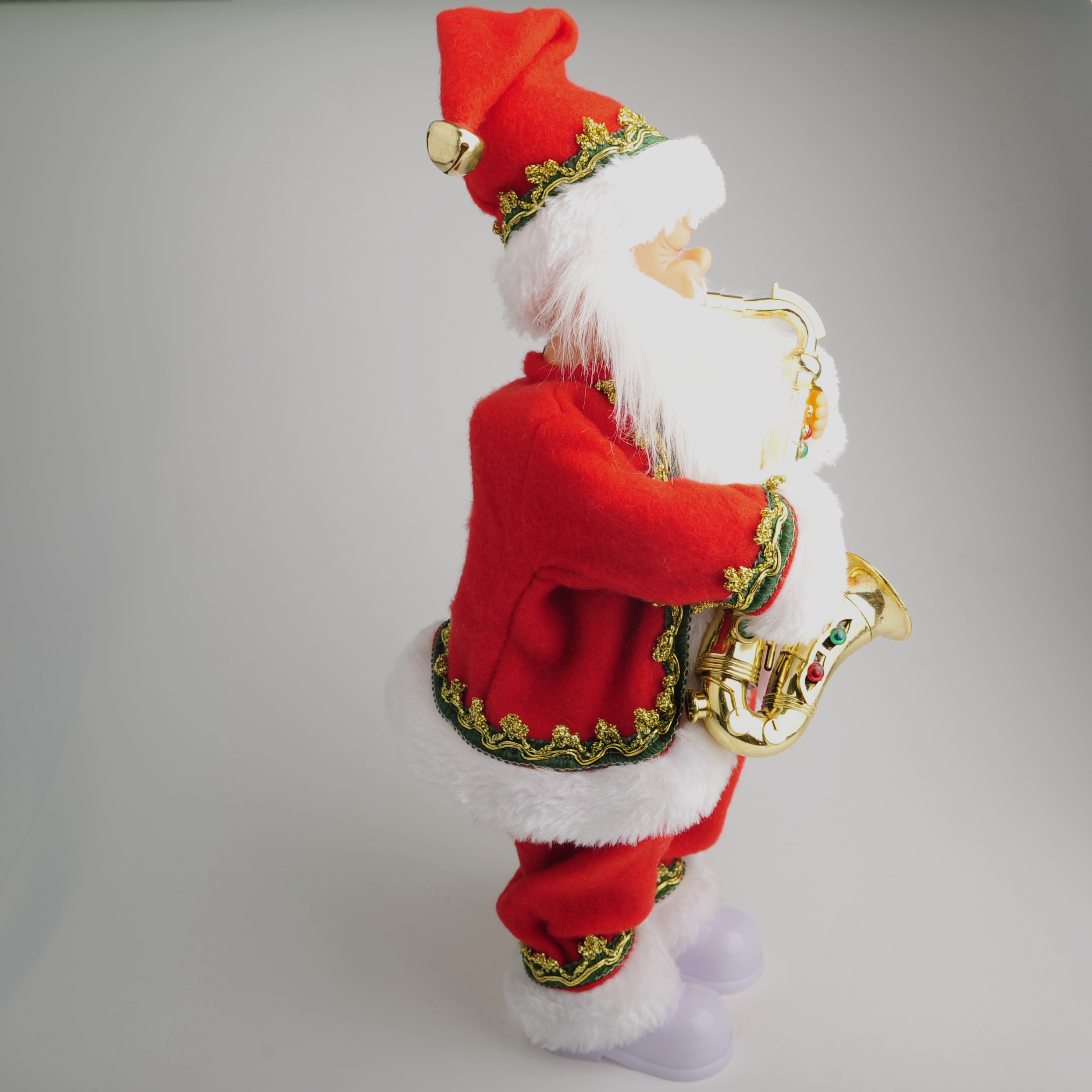 Christmas decorations, electric toys, saxophone, wind instruments, music, Santa Claus details Picture
