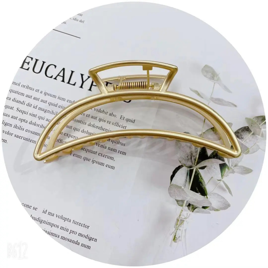 天意饰品 网红爆款 女士时尚高端   合金11公分亚金爪子      月亮白底实物图