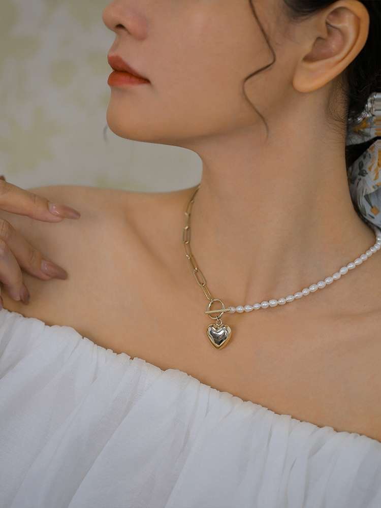  艳炟珍珠项链桃心轻奢小众设计感气质个性金属拼接爱心吊坠锁骨链详情图4