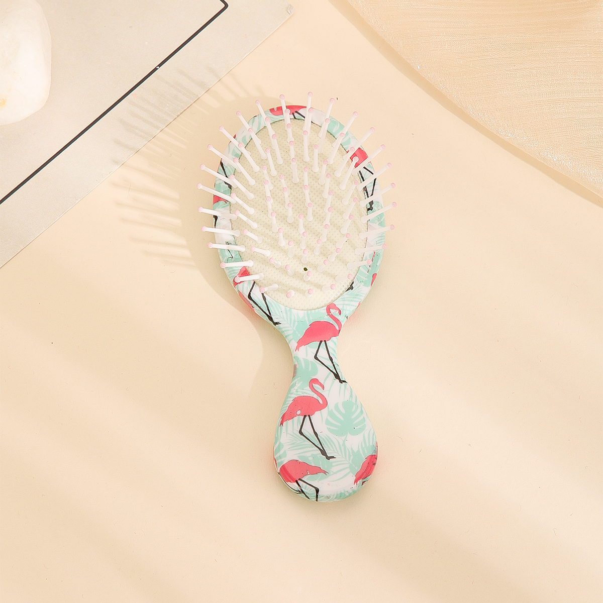 The small and mini airbag comb for women is not harmful to the scalp. It is a plastic comb and a cute cartoon airbag comb Item Picture