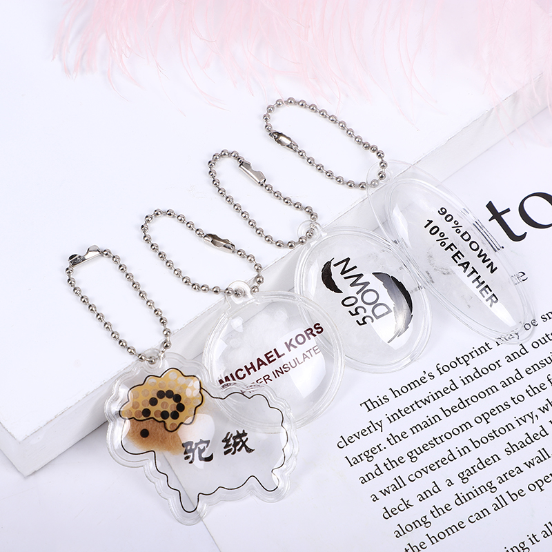 厂家定做羽绒标冬装羽绒服饰pvc充气式羽绒包logo丝印加工定制