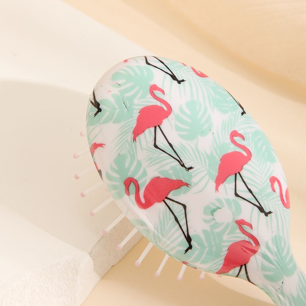 The small and mini airbag comb for women is not harmful to the scalp. It is a plastic comb and a cute cartoon airbag comb Specification image