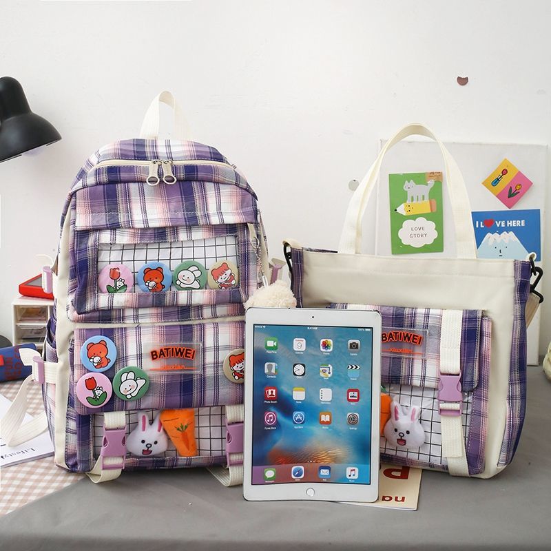 初中双肩包/帆布背包/书包多件套白底实物图