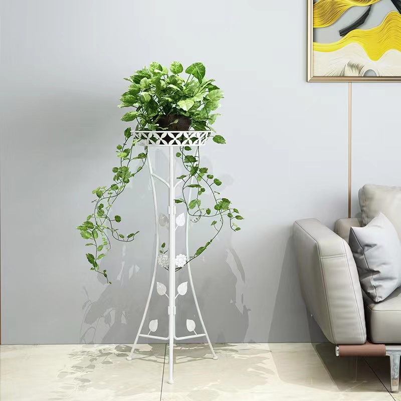 The ironwork floor-standing flower rack is used for indoor living room and balcony decoration. It is a simple European-style flower pot storage rack details Picture