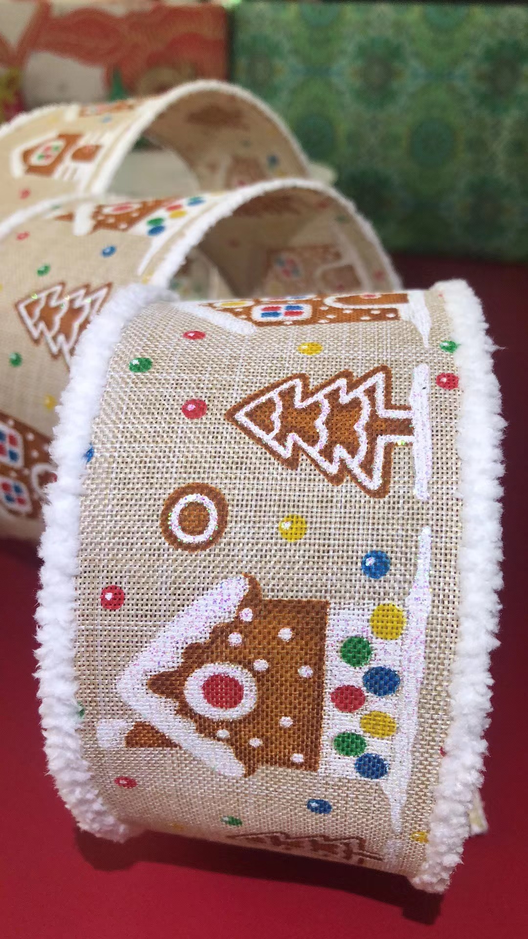 Item No. : 22-026 Christmas Gift Packaging Decoration DIY Linen Multicolored Printed Small House White fringed Christmas Iron Wire Tape 6.3cm Item No. : 22-026 Christmas Gift Packaging Decoration DIY Linen Multicolored Printed Small House White fringed Christmas Iron Wire Tape 6.3cm