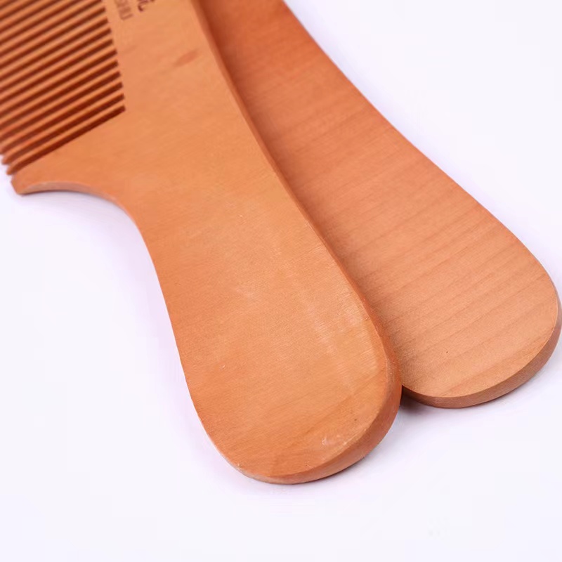 桃木梳白底实物图