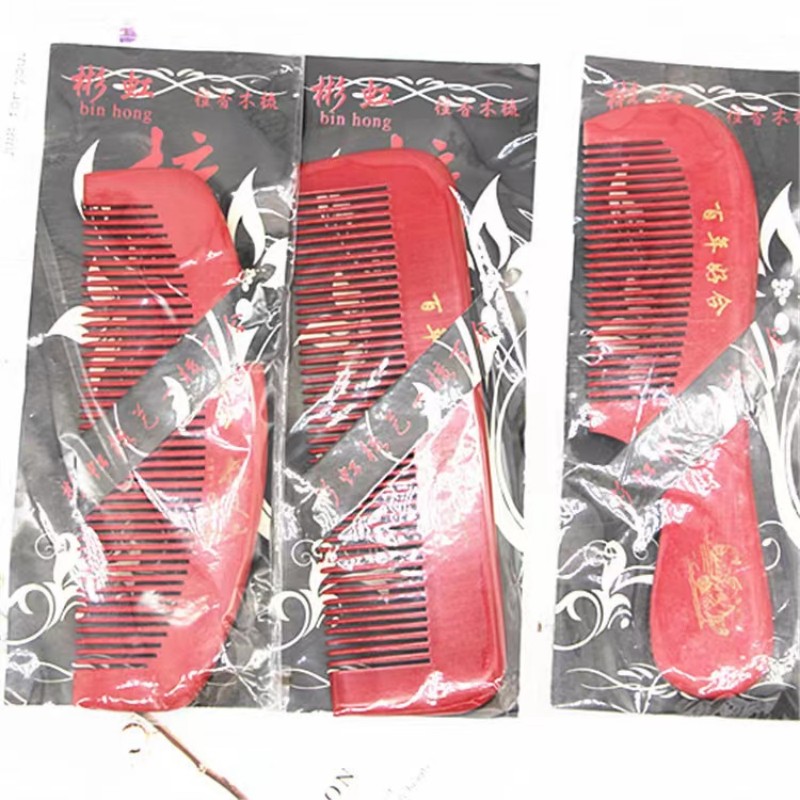Factory direct sales of thickened combs made of red peach wood Item Picture