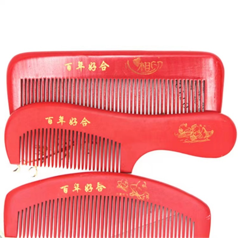 Factory direct sales of thickened combs made of red peach wood