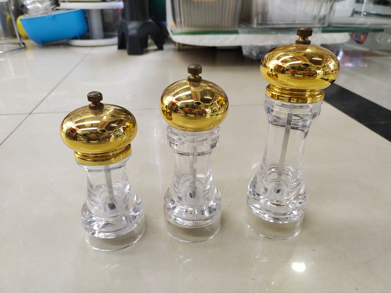 Direct sales from the manufacturer of gold and silver acrylic pepper grinders