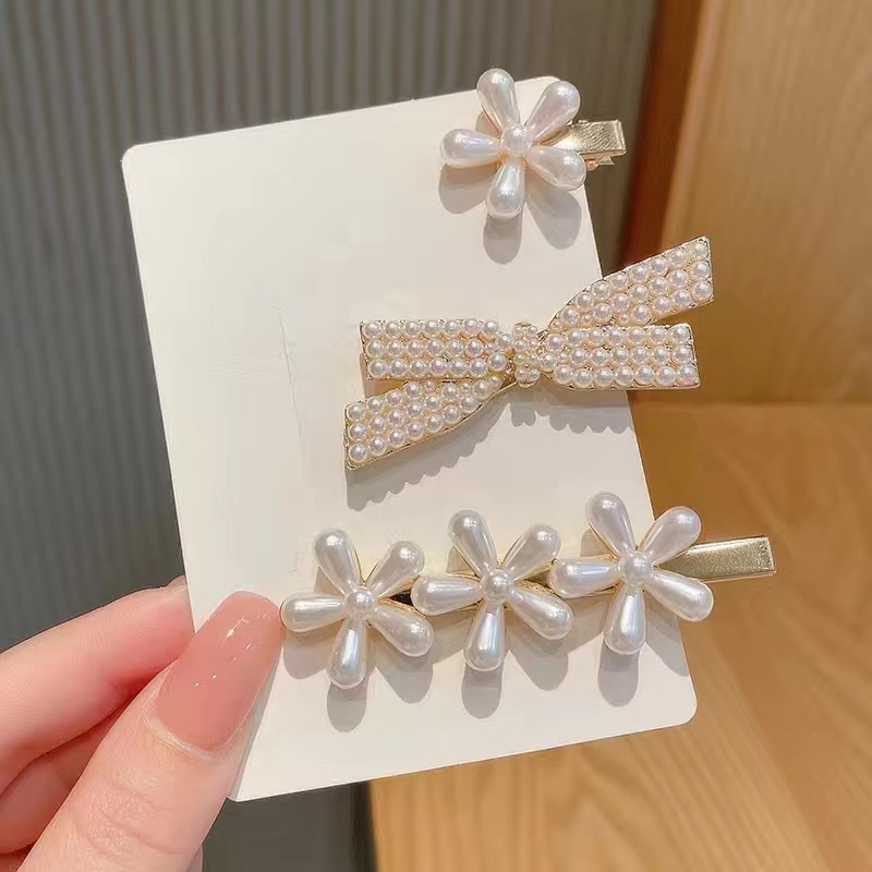 Korean ins pearl hair clips, a popular hollowed-out versatile metal edge clip, bangs clip headwear, and a simple one-line clip