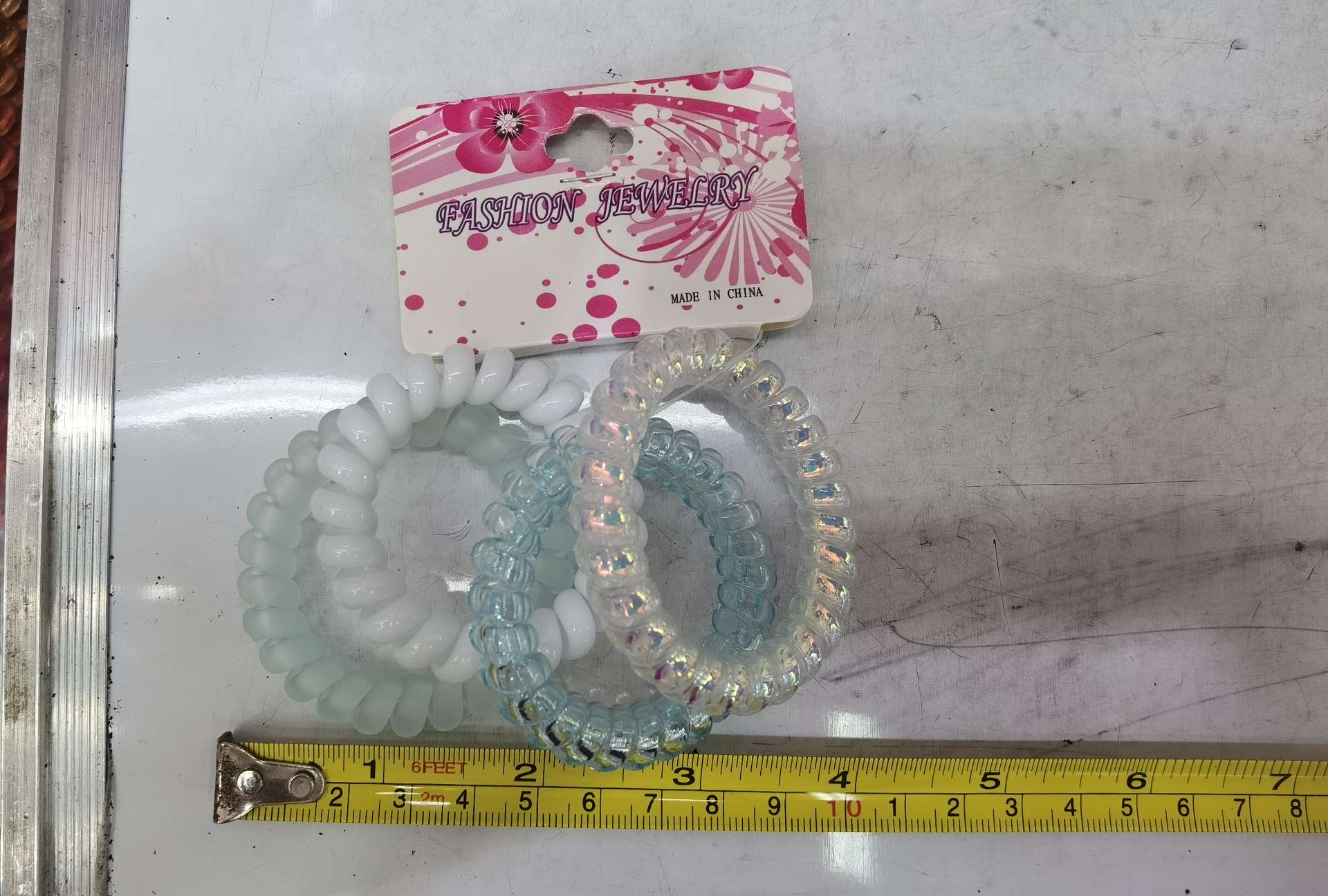 The bright silver high-elasticity telephone line hair tie is simple and durable. It is a high-elasticity hair tie accessory Item Picture