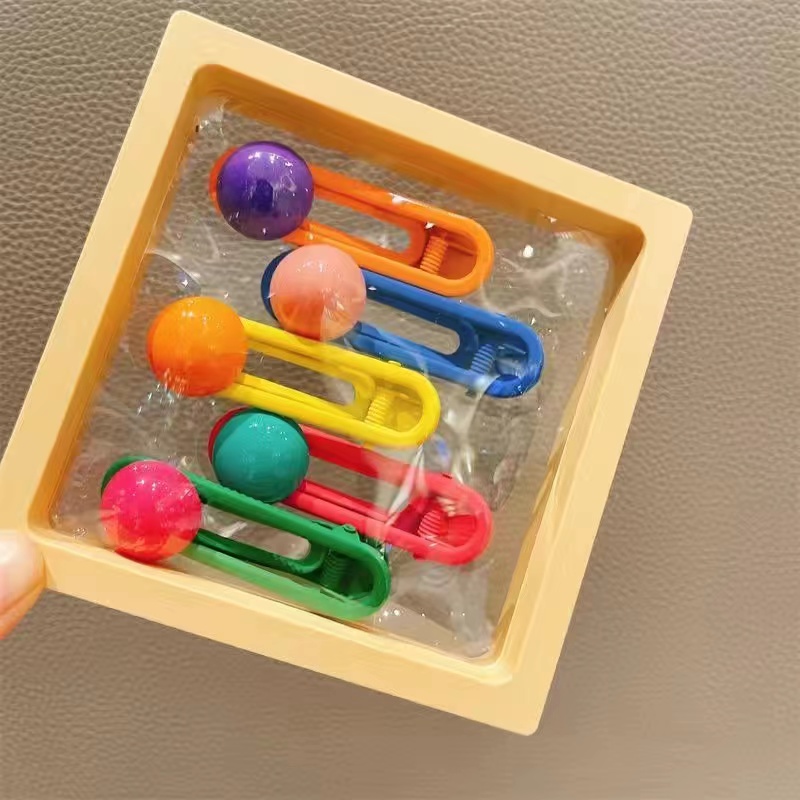 A new Korean children's cute candy bean hair clip cartoon clip parent-child set for girls, featuring a hollowed-out hair clip headpiece Item Picture