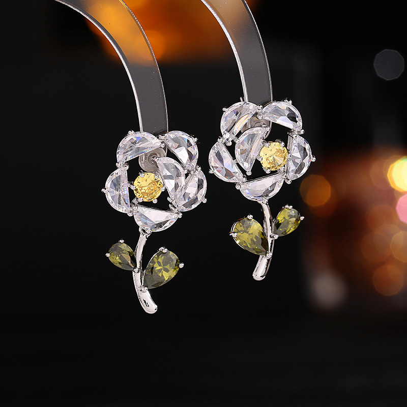 Wholesale of s925 silver needle earrings with a niche design sense, super flash zircon inlaid stud earrings, high-end and elegant flower earrings details Picture