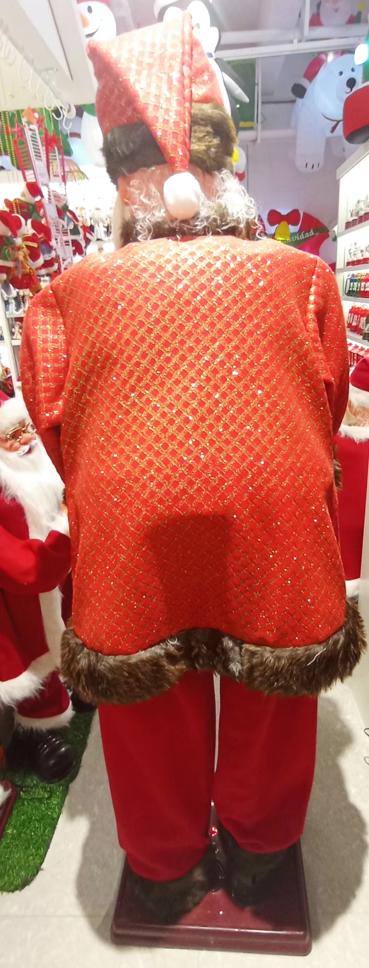 9123 Christmas Decoration: Standing, playing the saxophone, twisting with music, Santa Claus figure Item Picture