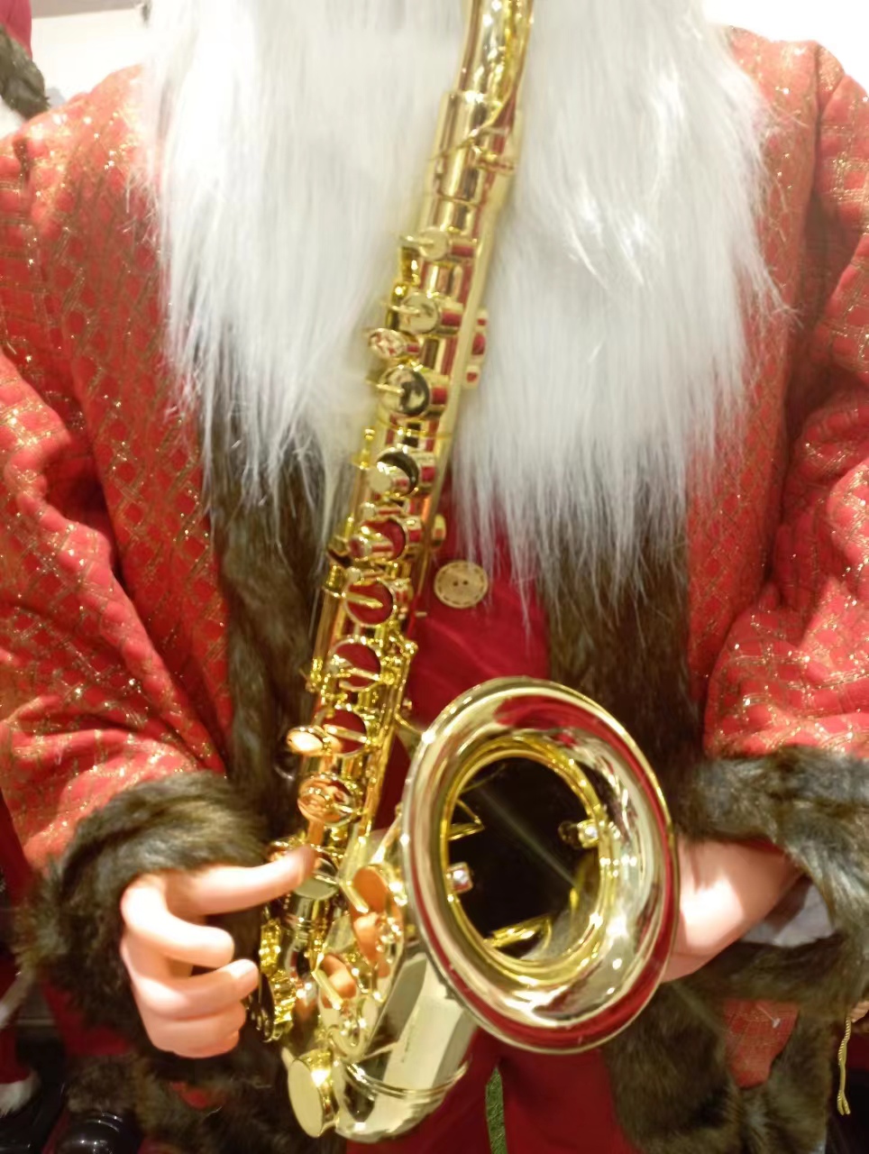9123 Christmas Decoration: Standing, playing the saxophone, twisting with music, Santa Claus figure details Picture